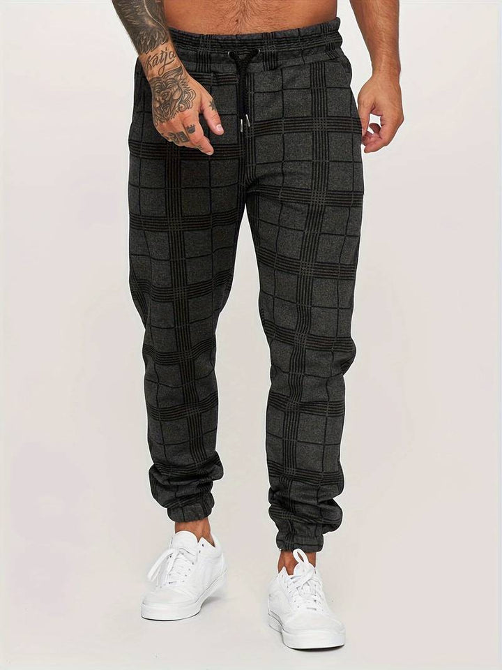 Levoire | Pantalon de course à slim fit à pois pour hommes Noir