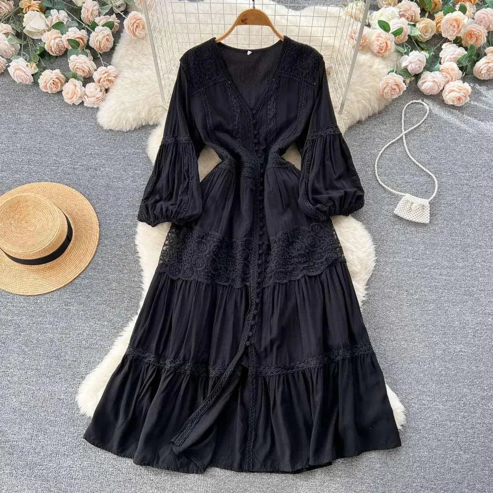 Levoire | Robe avec manches bouffantes et taille délicate Noir