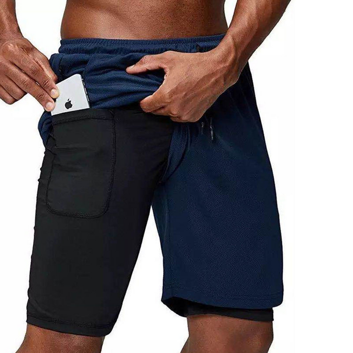 Levoire | Double couche short de course Incl. poche pour téléphone & fente Bleu marine