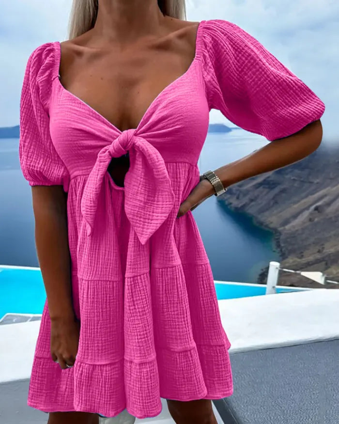 Levoire | Robe à manches courtes avec décolleté en V et nœud sur la poitrine Rouge rosé