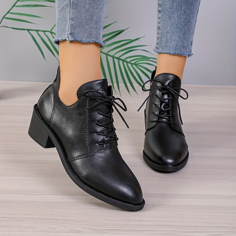 Levoire | Bottes Unies Élégantes Avec Lacets Et Talons