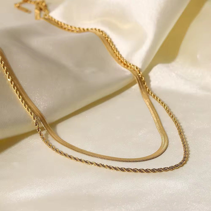 Levoire | Collier Doré À Double Rangée Composé De Chaîne En Maillons Et De Chaîne Serpent