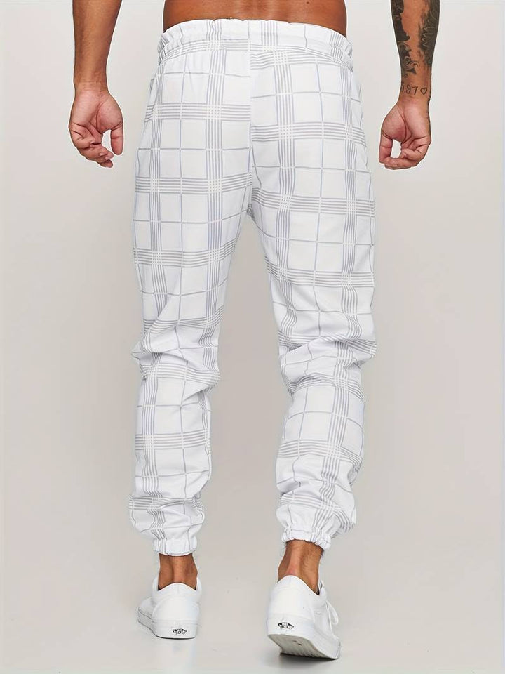 Levoire | Pantalon de course à slim fit à pois pour hommes