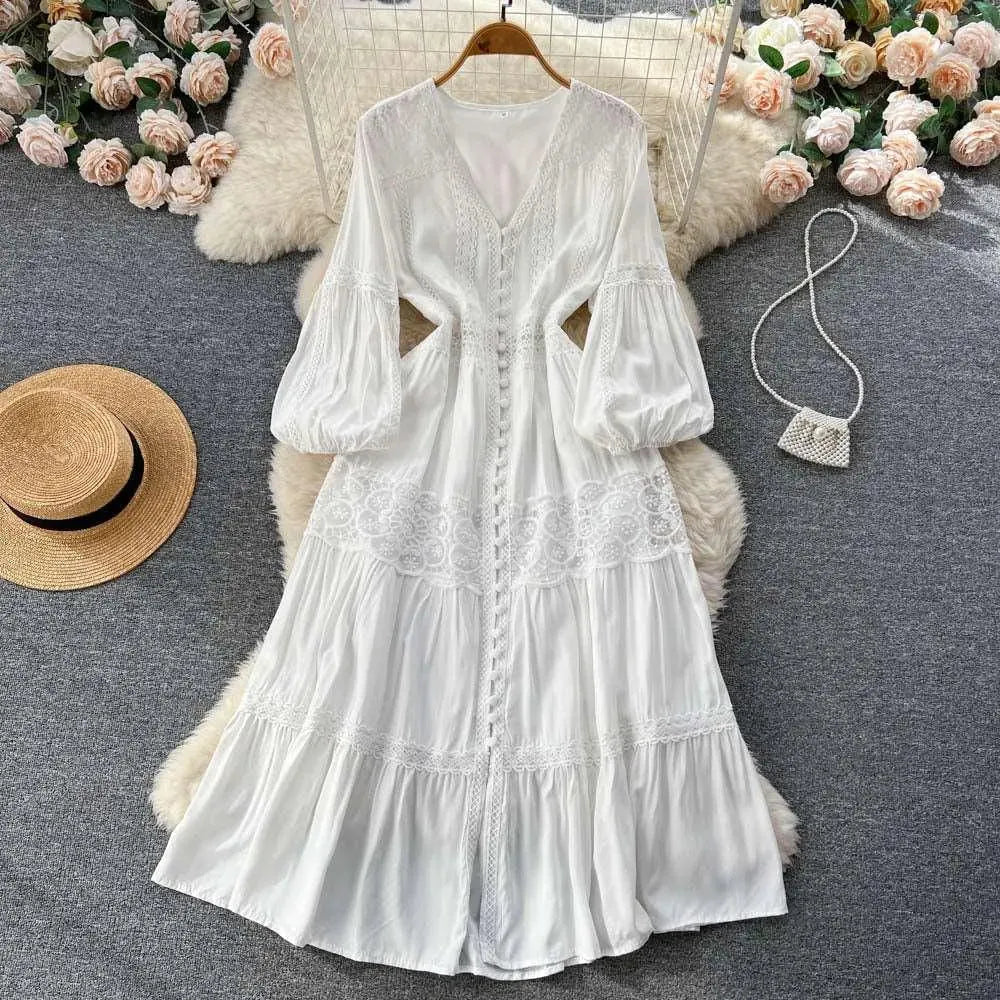 Levoire | Robe avec manches bouffantes et taille délicate