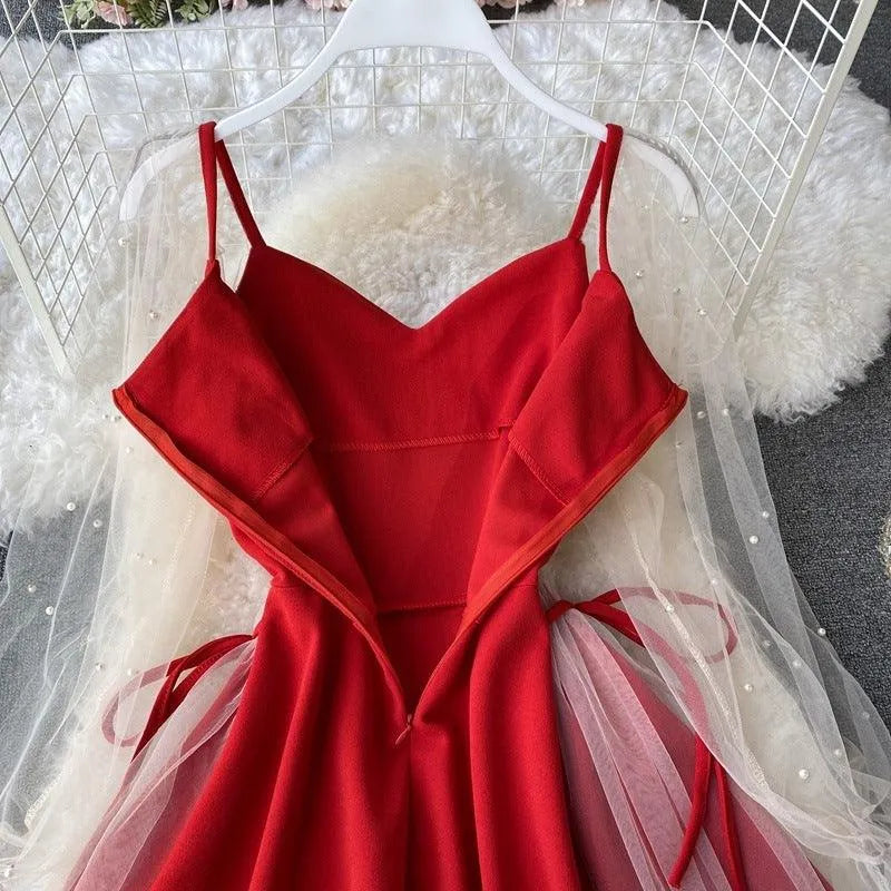 Levoire | Robe en forme A avec des bretelles bouffantes et un décolleté en V