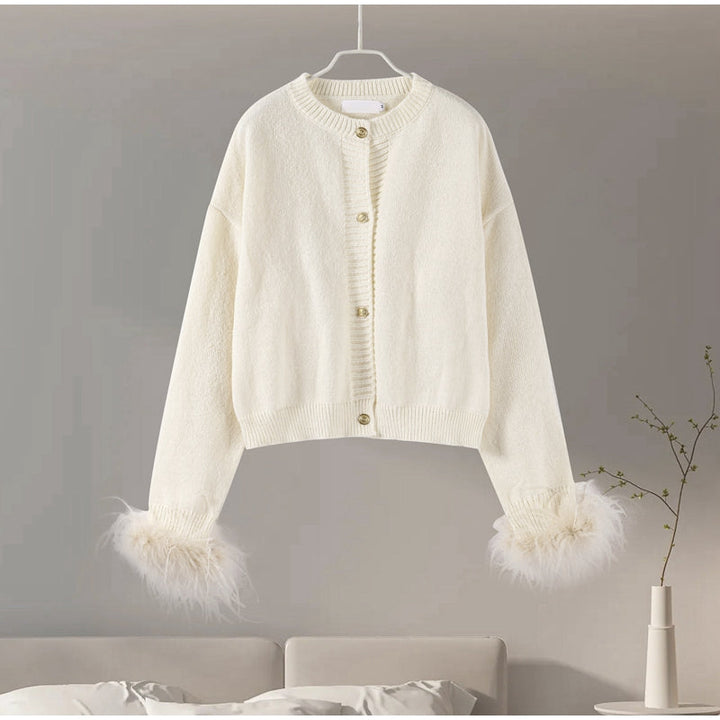 Levoire | Veste En Tricot Élégante Avec Accent Plume Blanc