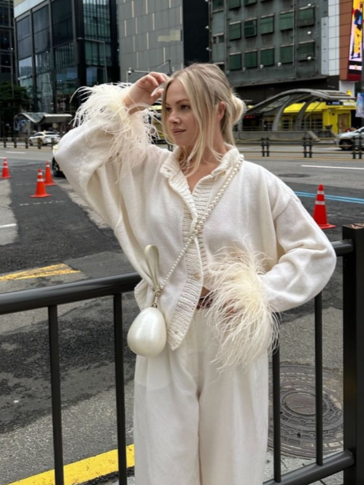 Levoire | Veste En Tricot Élégante Avec Accent Plume