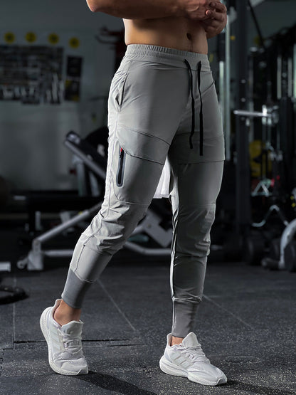 Levoire | Pantalon d'entraînement avec Résistance à l'Eau et Design Urbain pour Tous les Sports Gris