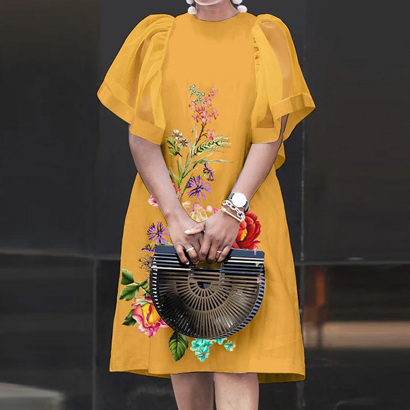 Levoire | Robe À Fleurs Élégante Avec Des Manches Aériennes Jaune