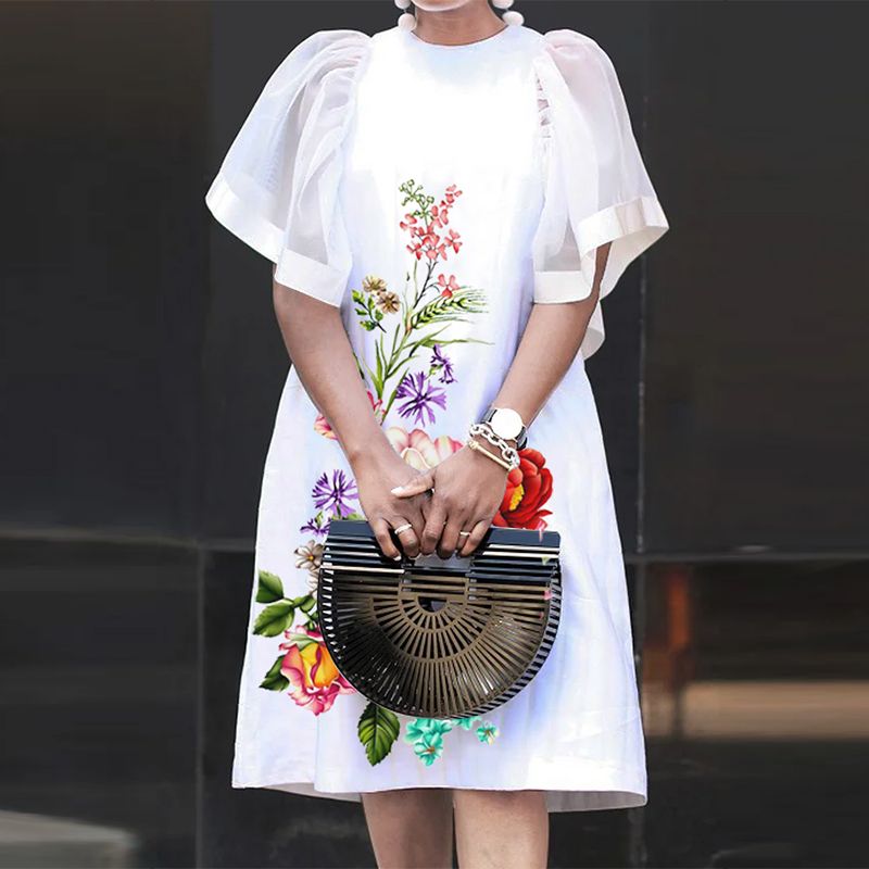 Levoire | Robe À Fleurs Élégante Avec Des Manches Aériennes Blanc