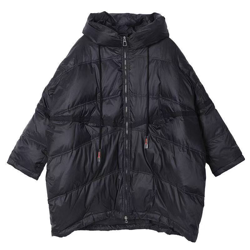Veste de transition matelassée pour femmes avec capuche généreuse et détails modernes Levoire