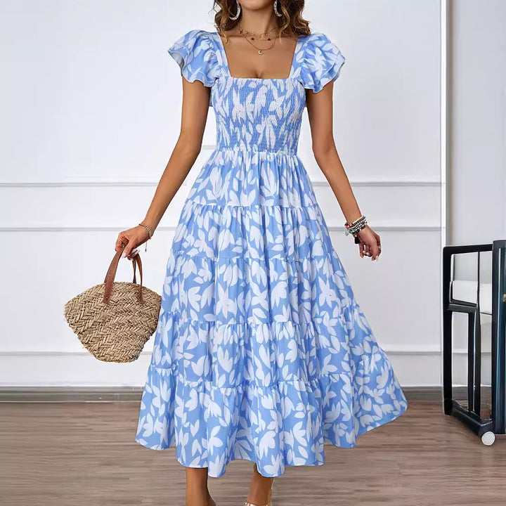 Robe maxi pour femmes avec des manches bouffantes volumineuses et un corps froncé Levoire