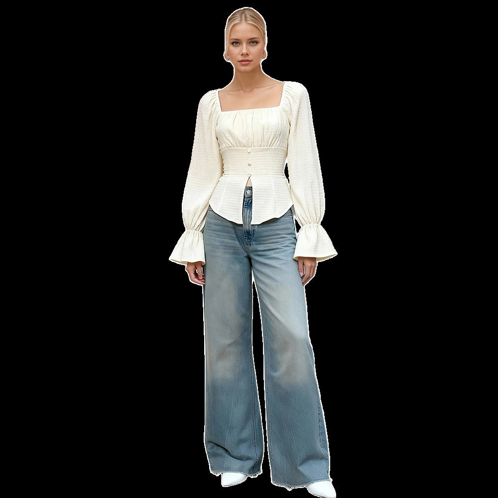 Blouse pour femmes avec des manches volantes extravagantes et une silhouette ajustée Levoire