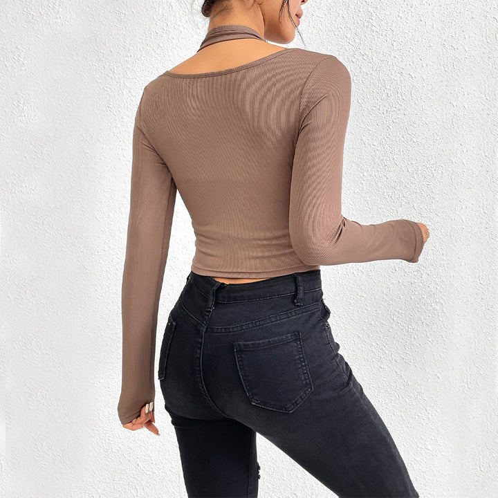 Chemise à manches longues cropped pour femmes avec un design élégant en torsion et des accents de couleur Levoire