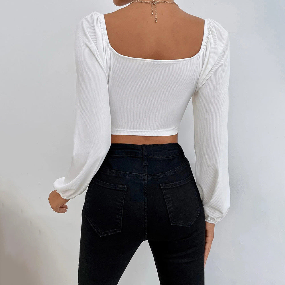 Top court pour femmes avec un design de manches bouffantes élégant et une silhouette ajustée Levoire