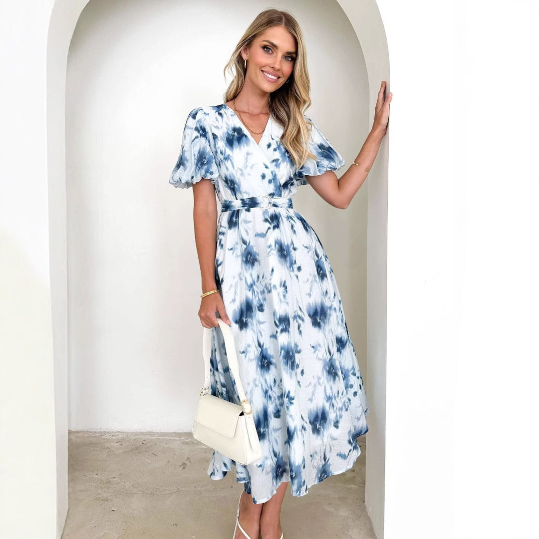 Robe midi pour femmes avec un design enveloppant ludique et des accents floraux Levoire
