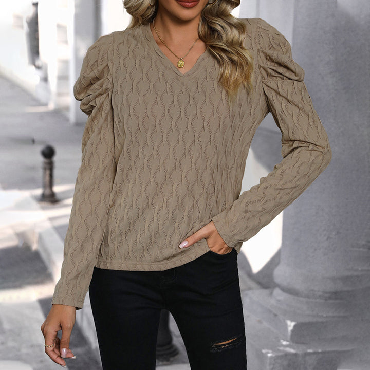 Pull pour femmes avec motif de vagues texturé et élégantes manches bouffantes Levoire