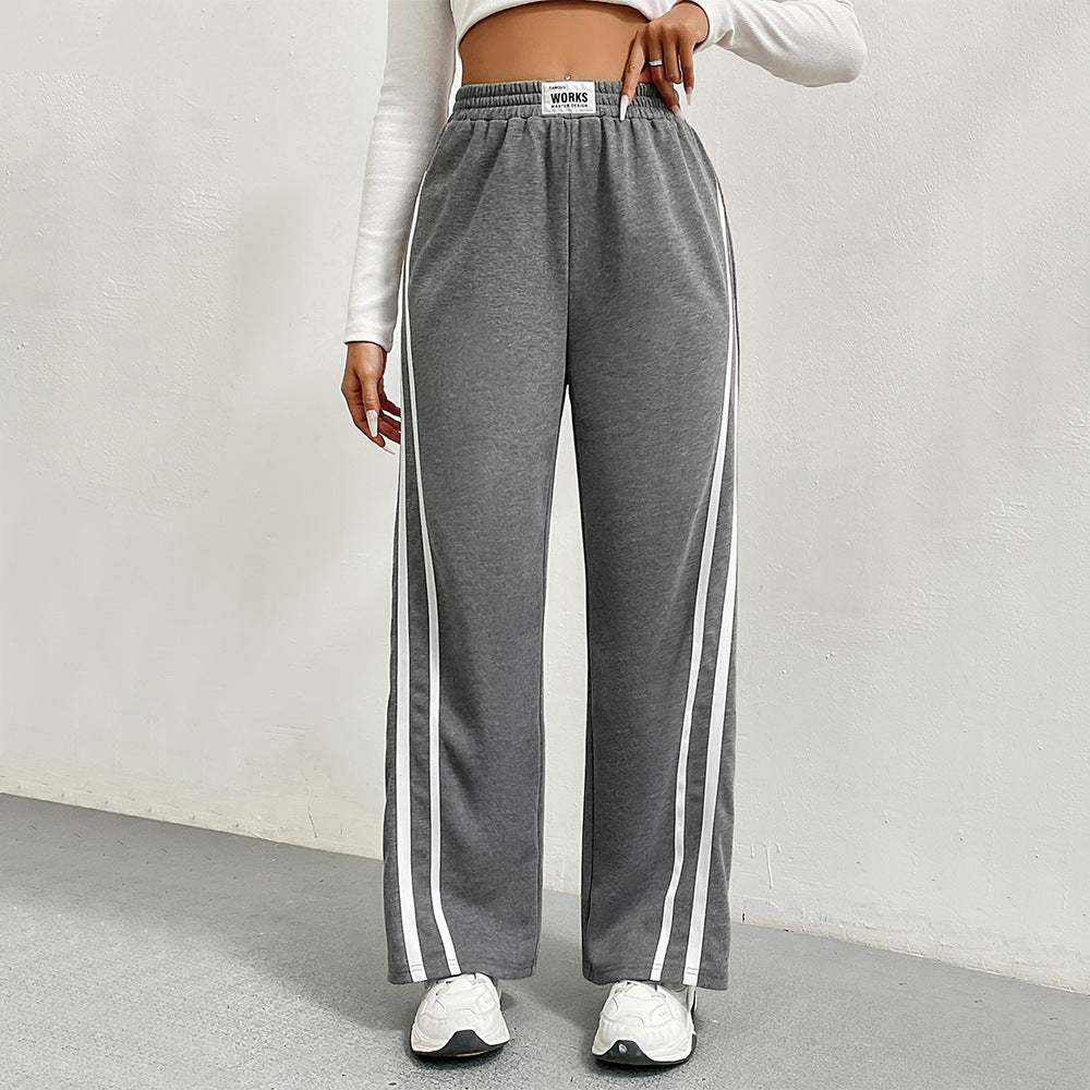 Pantalons de loisirs sportifs pour femmes avec coupe large et rayures contrastées Levoire