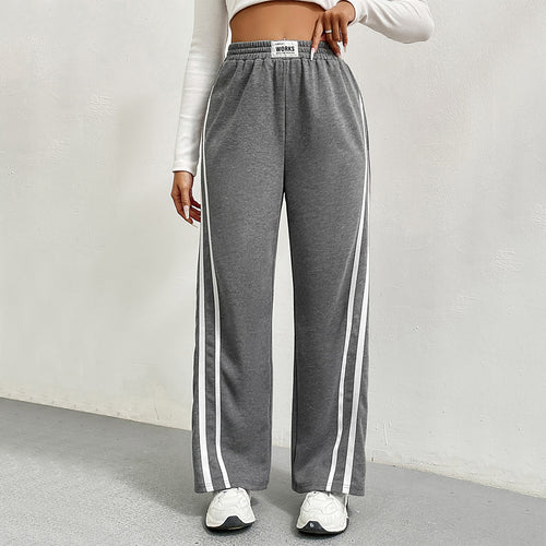 Pantalons de loisirs sportifs pour femmes avec coupe large et rayures contrastées Levoire