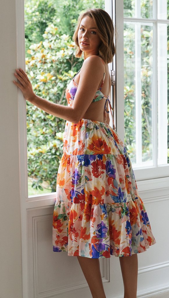 Robe midi-femmes Claudia avec un motif floral ludique et une jupe fluide Levoire