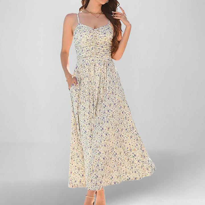 Robe maxi femme avec fines bretelles et poches latérales pratiques Levoire