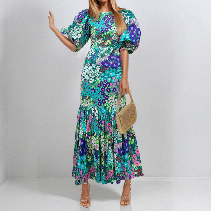 Robe maxi pour femmes avec des manches bouffantes volumineuses et des motifs floraux Levoire