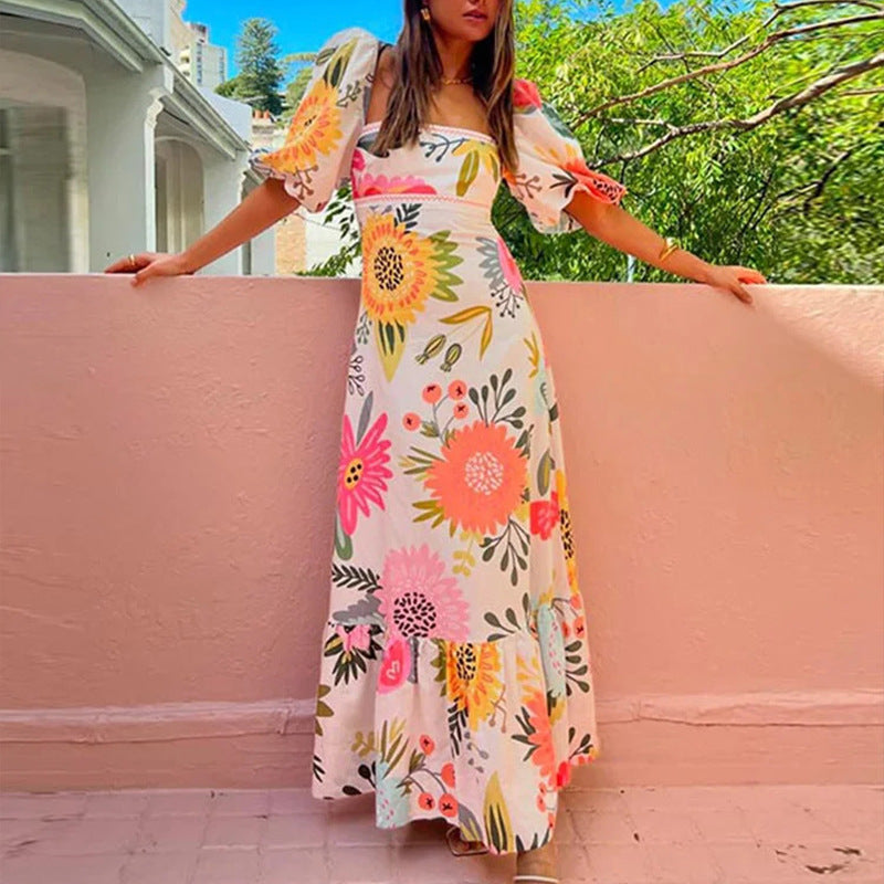 Robe maxi femme avec manches bouffantes et détails imprimés floraux Levoire