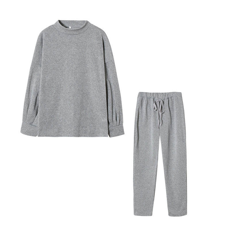Ensemble de survêtement pour femmes avec une coupe moderne, un haut à col montant et un pantalon élastique Levoire