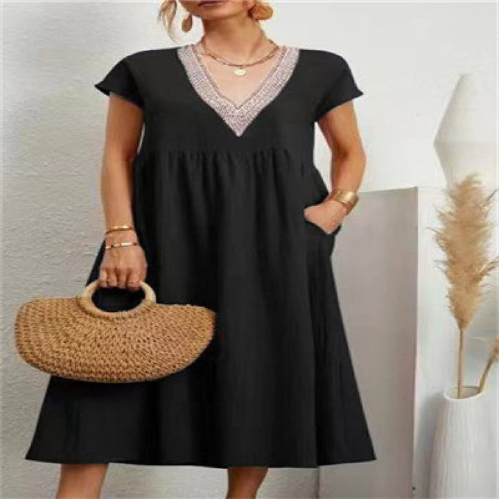 Robe maxi femme avec un élégant décolleté en V et des poches latérales Levoire