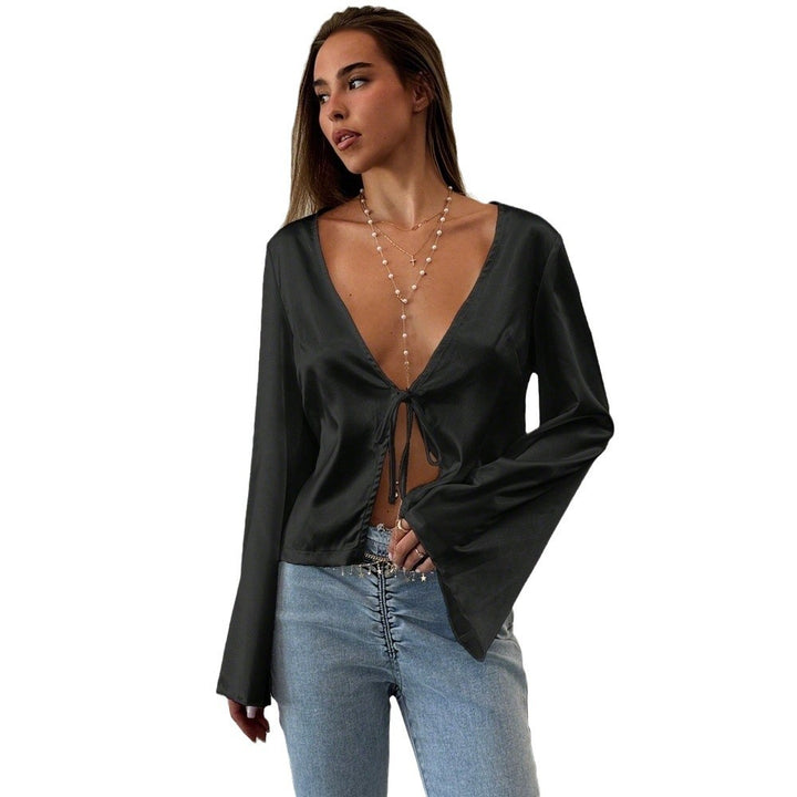 Blouse élégante femme avec décolleté en V profond et détail de nœud décontracté Levoire