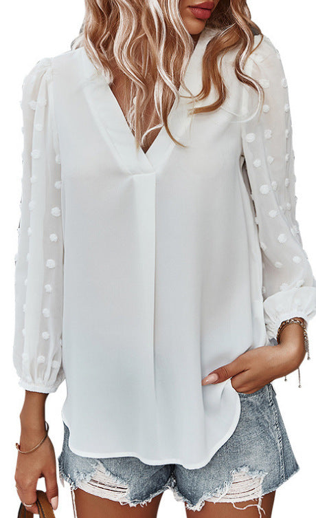 Blouse pour femmes avec des manches bouffantes transparentes et un détail à pois Levoire
