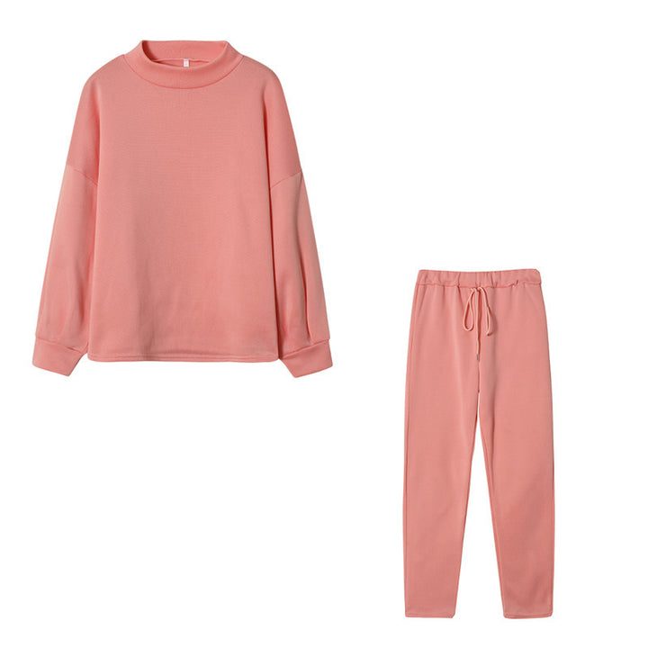 Ensemble de survêtement pour femmes avec une coupe moderne, un haut à col montant et un pantalon élastique Levoire