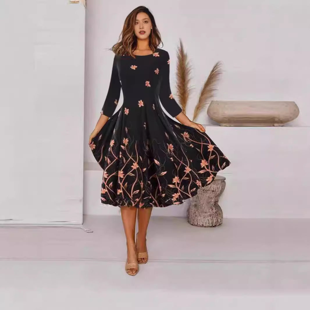 Levoire | Élégante robe imprimée à col rond à manches 3/4