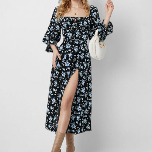 Robe midi pour femmes avec un design floral ludique et une fente haute Levoire