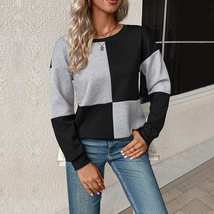 Sweat-shirt féminin à la mode avec design à rayures bloc et col rond Levoire