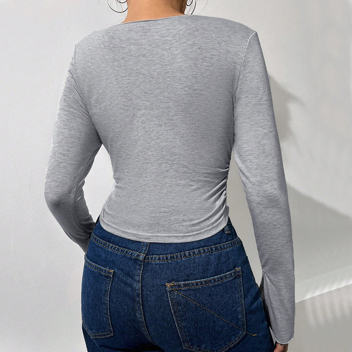 Chemise à manches longues cropped pour femmes avec des manches évasées à la mode et un élégant col en V Levoire