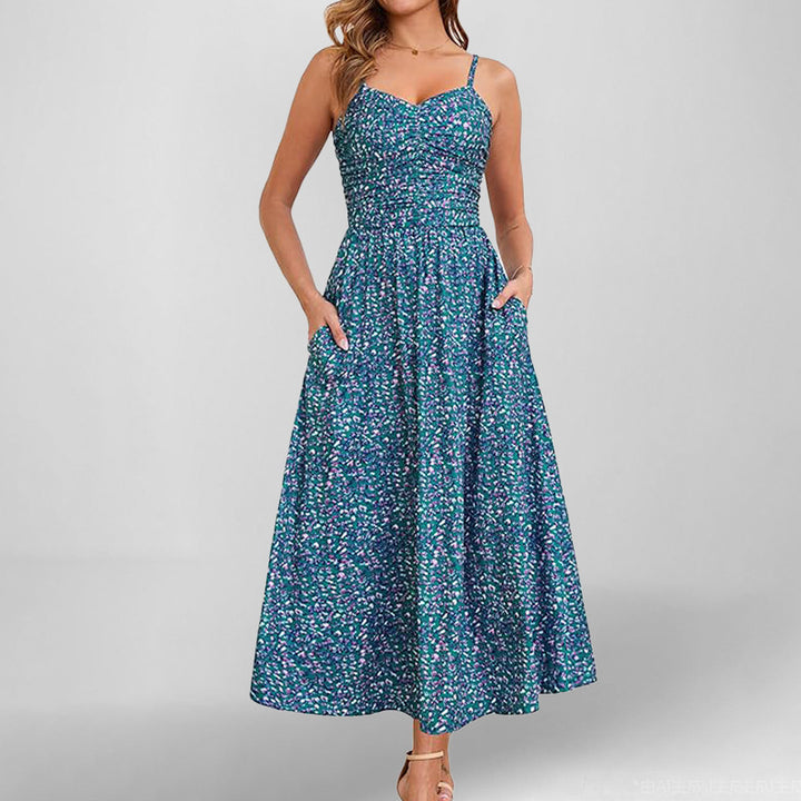Robe maxi femme avec fines bretelles et poches latérales pratiques Levoire