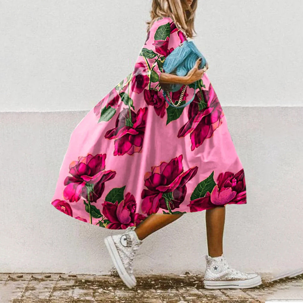 Levoire | Élégante robe en imprimé paisley fleuri, avec des manches trois quarts 1-Fondation Rose