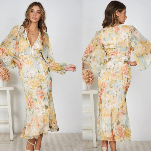 Robe maxi femme avec des manches volumineuses et des détails décoratifs Levoire