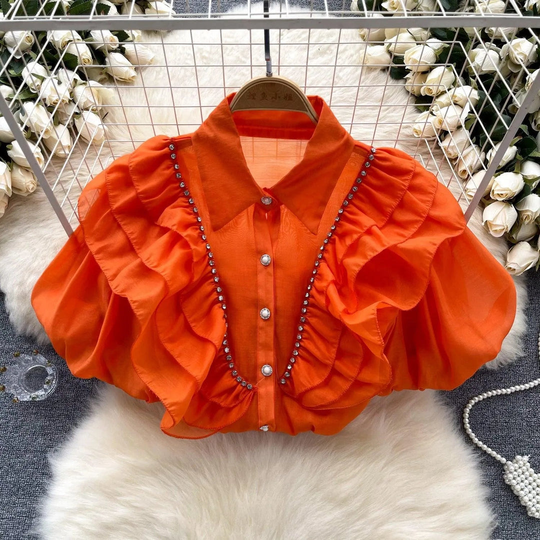 Levoire | Top avec des diamants transparents et fins et des manches bouffantes Orange Rouge Taille libre