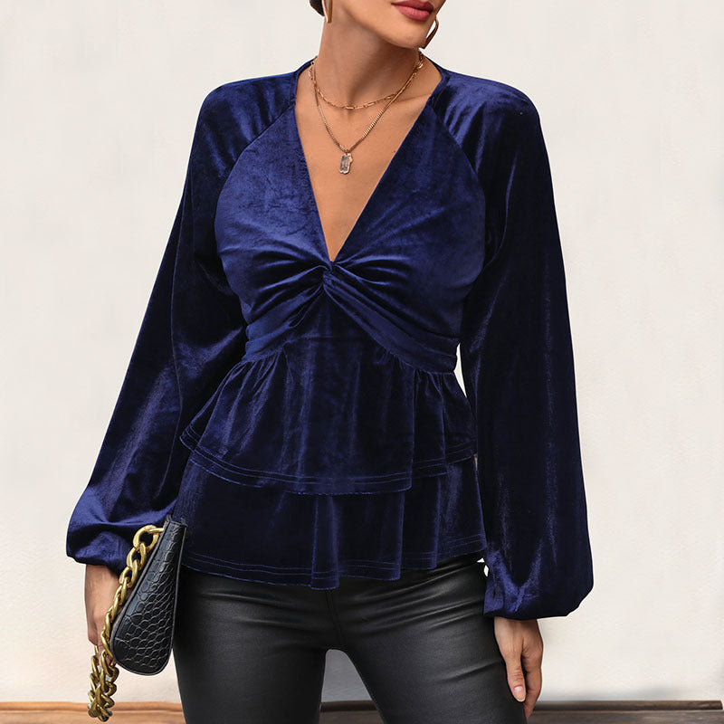 Top féminin avec un peplum volumineux et un décolleté en V profond Levoire