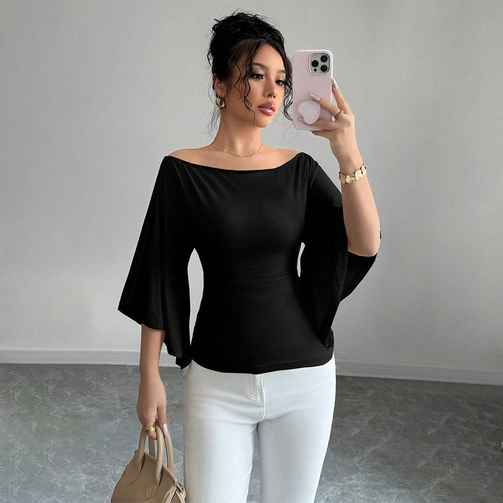 Haut élégant femme à épaules dénudées avec manches larges et coupe ajustée Levoire