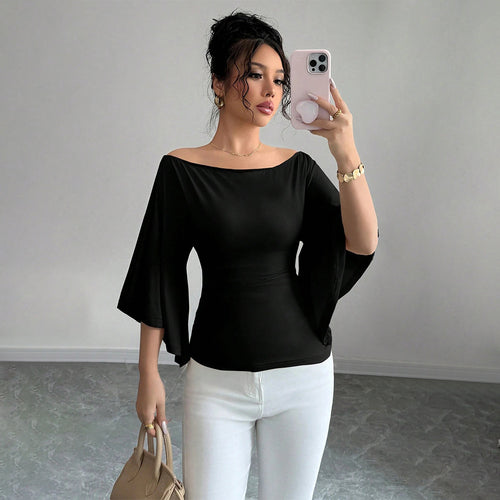 Haut élégant femme à épaules dénudées avec manches larges et coupe ajustée Levoire