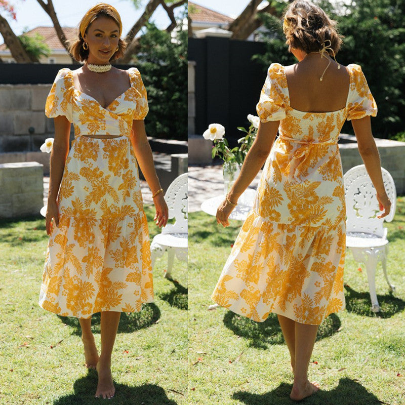 Robe midi femme avec décolleté en cascade et détails floraux Levoire