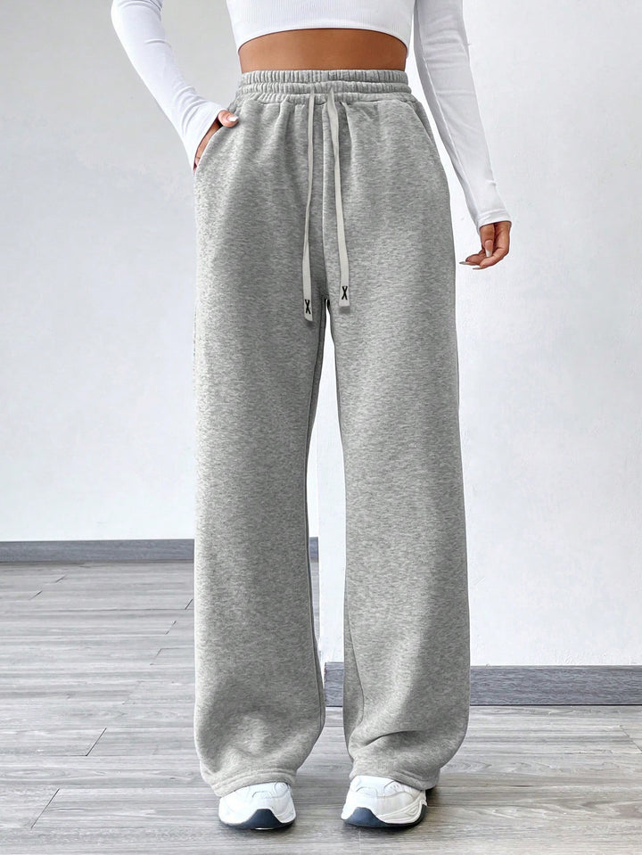 Pantalons de loisirs amples pour femmes avec taille élastique et poches latérales pratiques Levoire