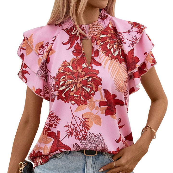 Top féminin avec des détails de volants ludiques et un motif floral Levoire