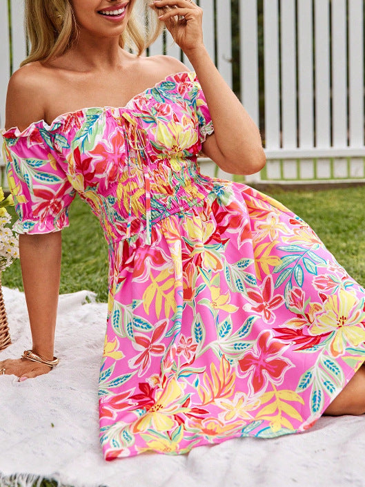 Robe d'été femme à épaules dénudées avec motif floral et éléments volants Levoire