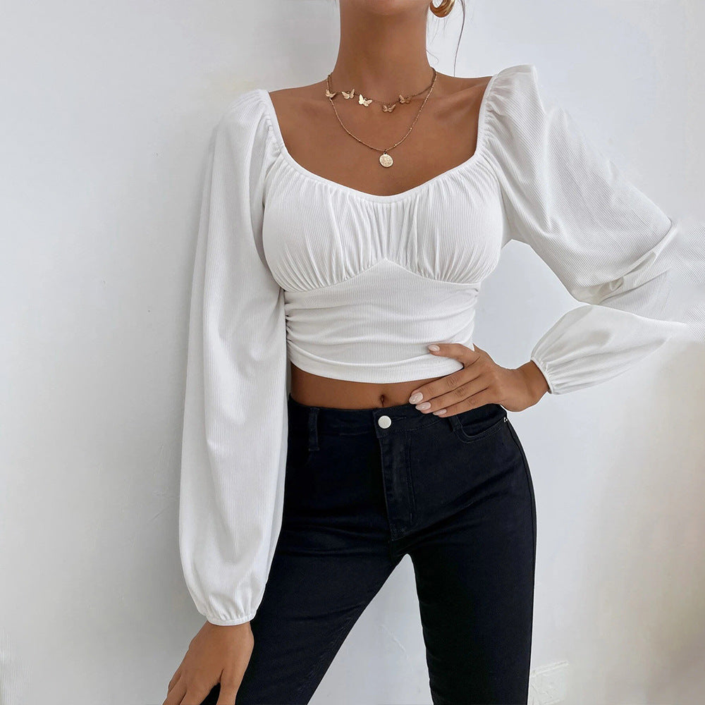 Top court pour femmes avec un design de manches bouffantes élégant et une silhouette ajustée Levoire