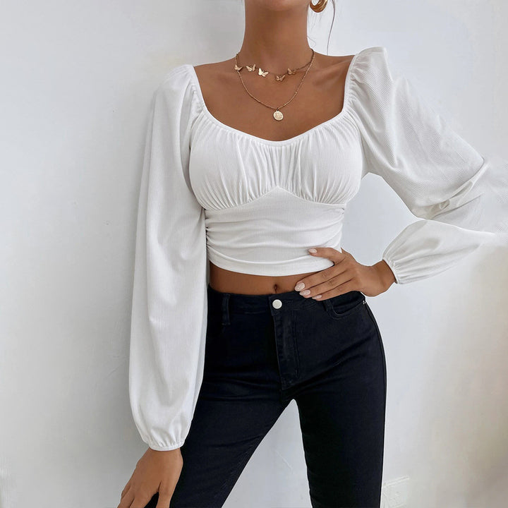 Haut court pour femmes avec un design de manches bouffantes élégant et une coupe ajustée Levoire