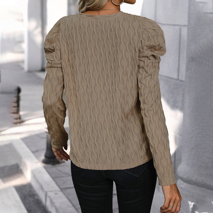 Pull pour femmes avec motif de vagues texturé et élégantes manches bouffantes Levoire